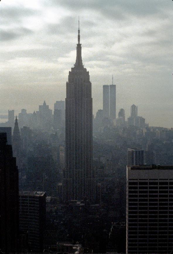 Empire State Building in the smog - from RCA Building; WTC in background