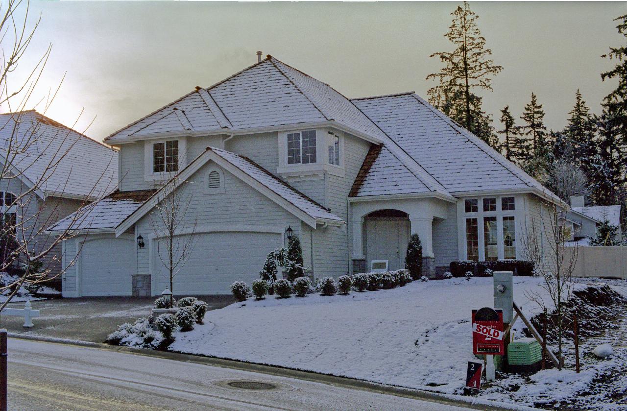 Snowy house seen from north west