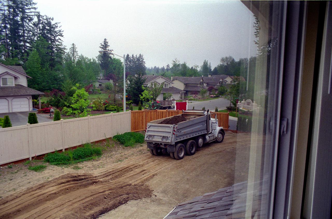 Dump truck in back yard