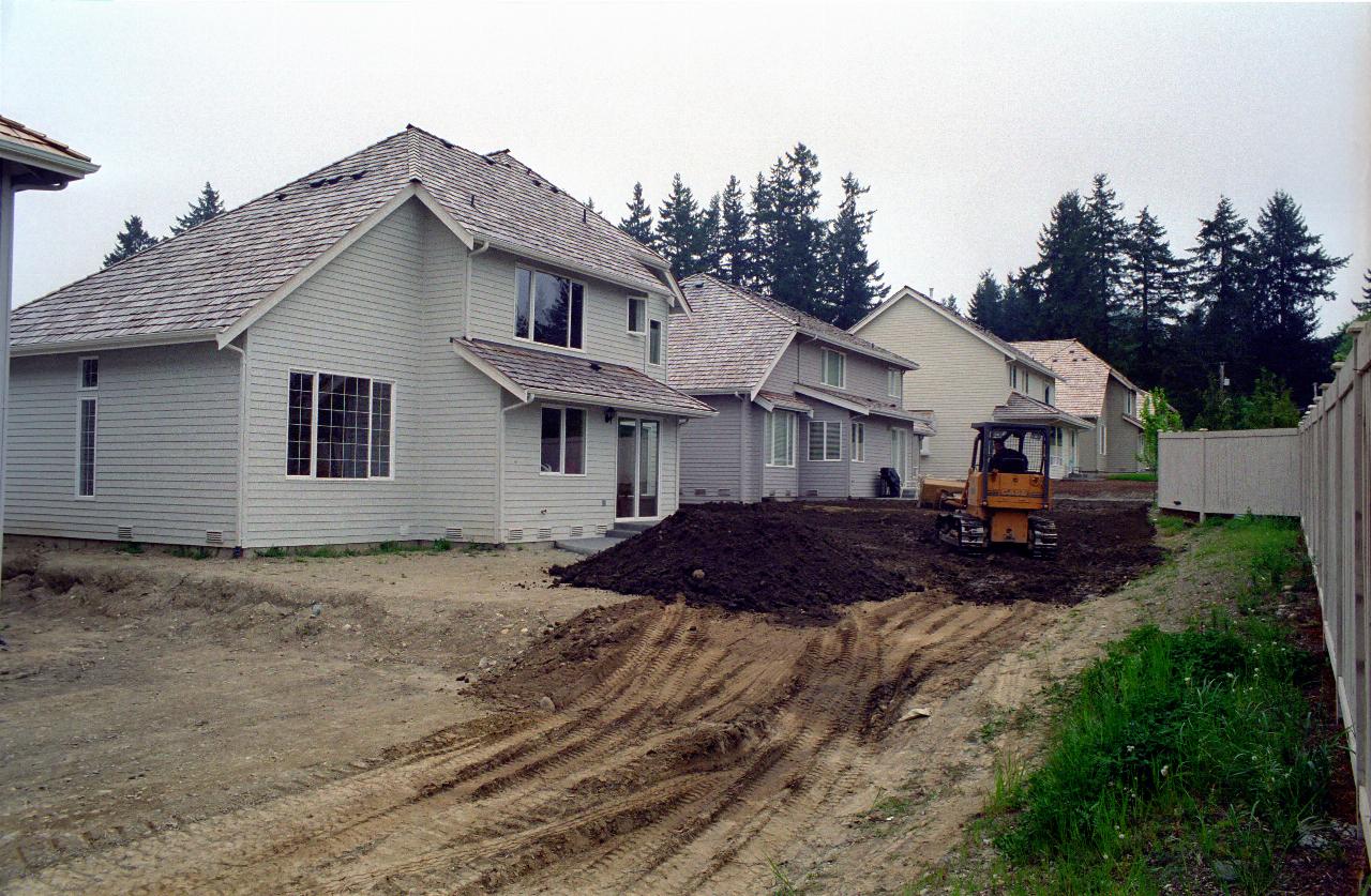 Grader in my back yard