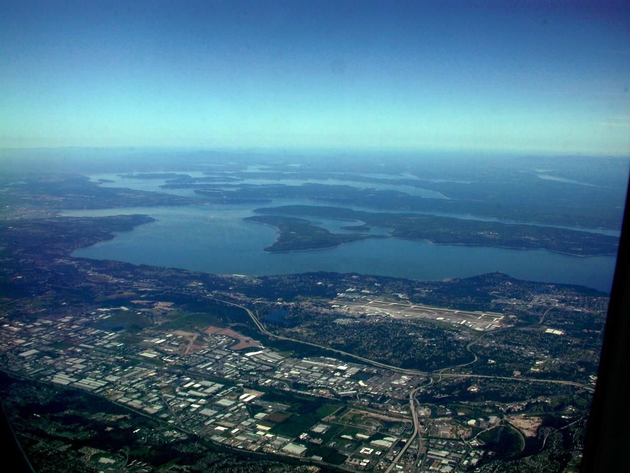 Land and water and including an airport