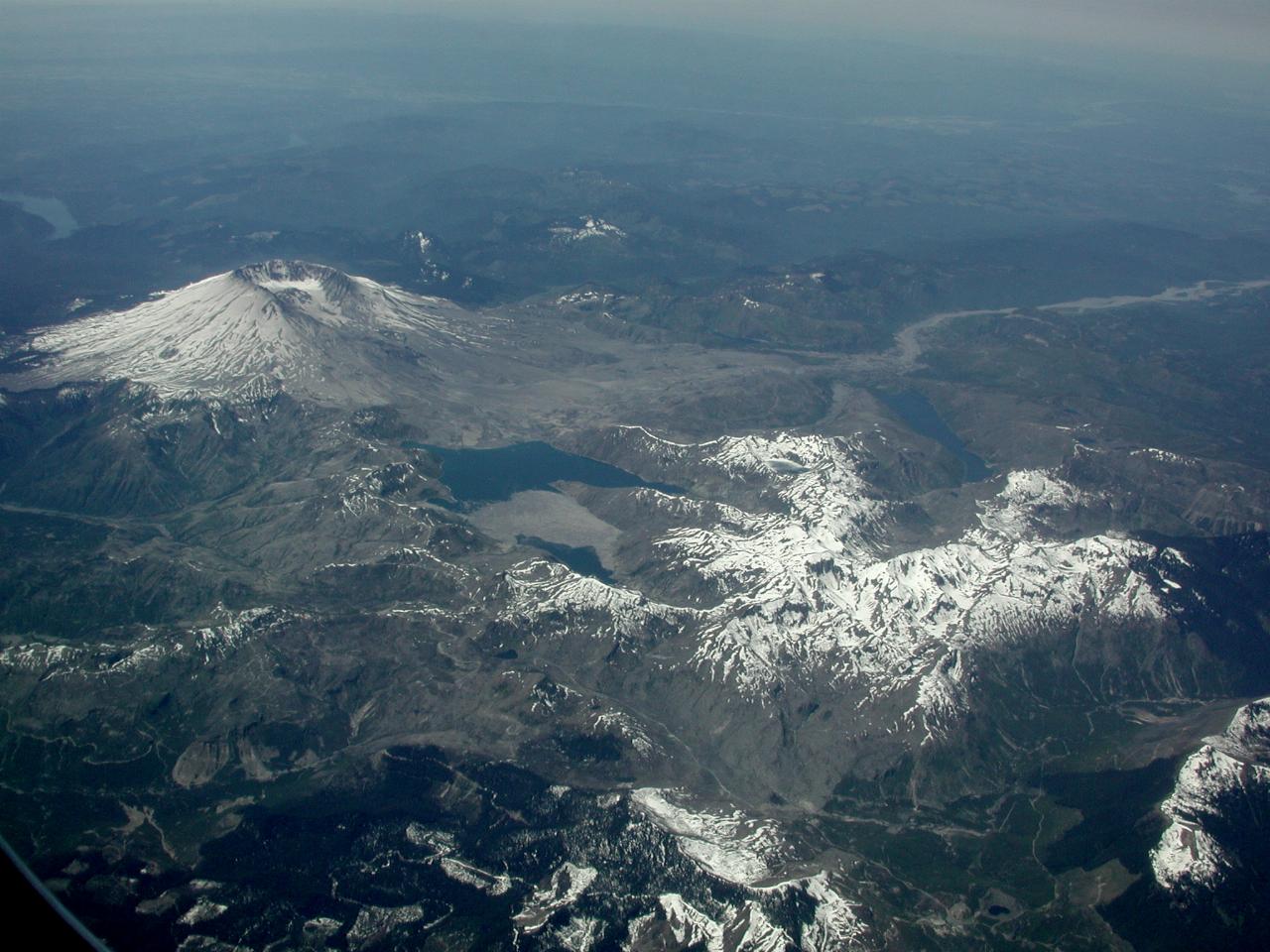 Snow capped volcano, snow covered peak and lakes