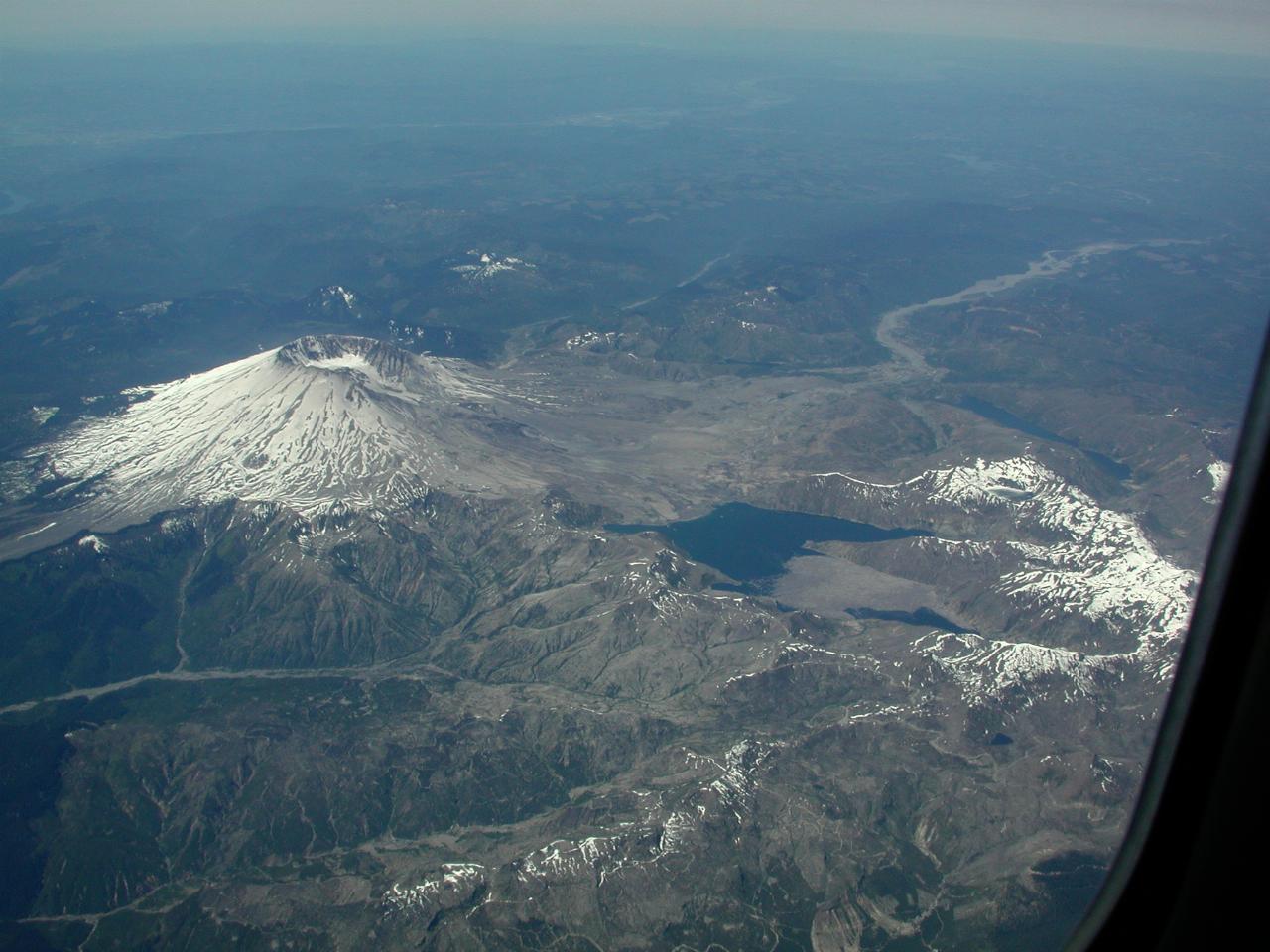 Snow capped volcano, snow covered peak and lakes