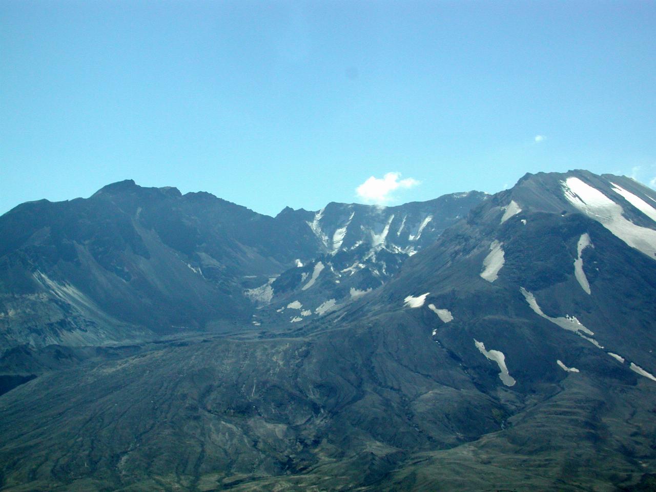 Closer view of volcanic peak with collapsed side