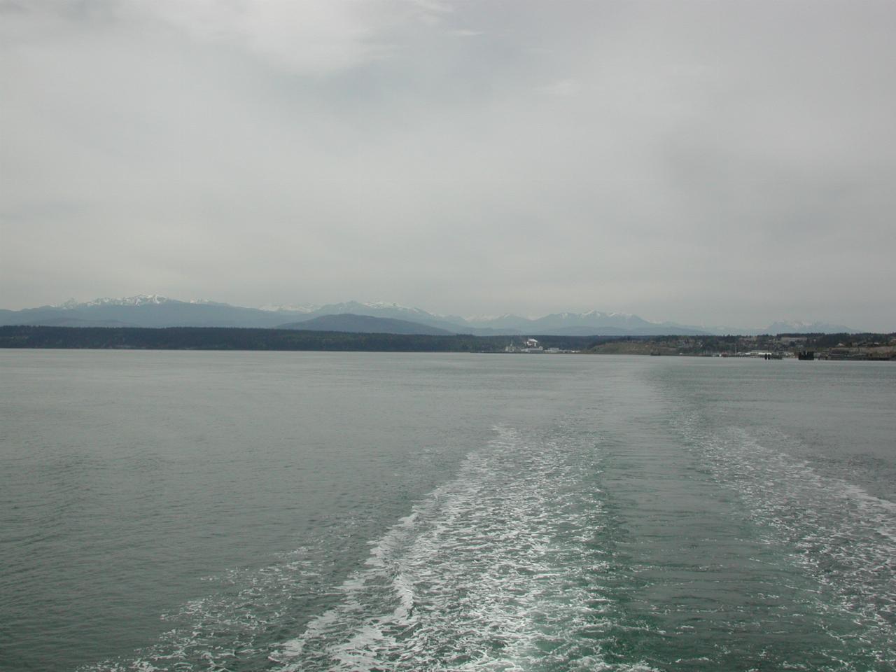 From back of ferry, departing Port Townsend, towards Olympic Mountains