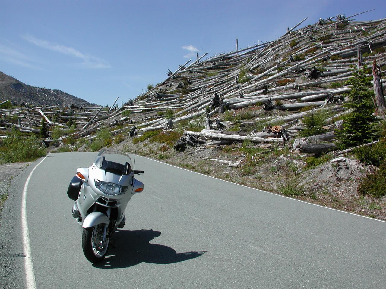 R1150RTA on road to Norway Pass, showing fallen trees (facing same direction)