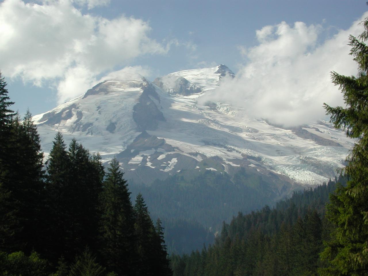 Mt. Baker, partly in clouds, seen from Boulder Creek on Baker Lake Road