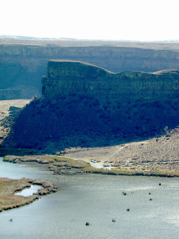 Close up of cars at base of Dry Falls