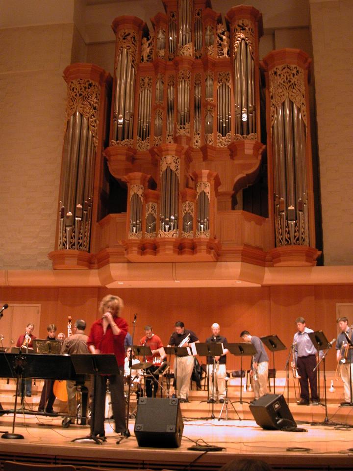 Greta Metassa - featured vocalist in front of pipe organ