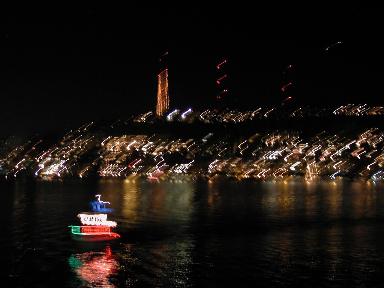 Queen AnnE Hill, from Lake Union; decorated TV tower and boat (our boat was also moving!)