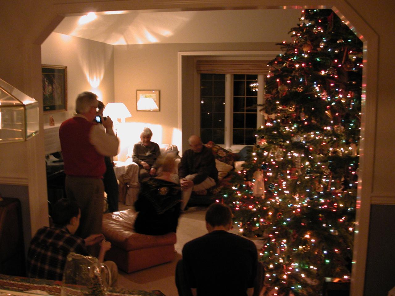 Christmas: clockwise - Bill (standing), Barbara, Jim, Matthew, Judy, Simon (Last 3 back to camera)