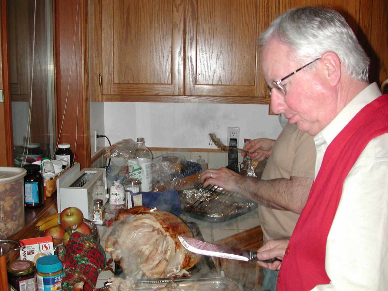 Bill with knife, Rick in the back, planning the turkey attack