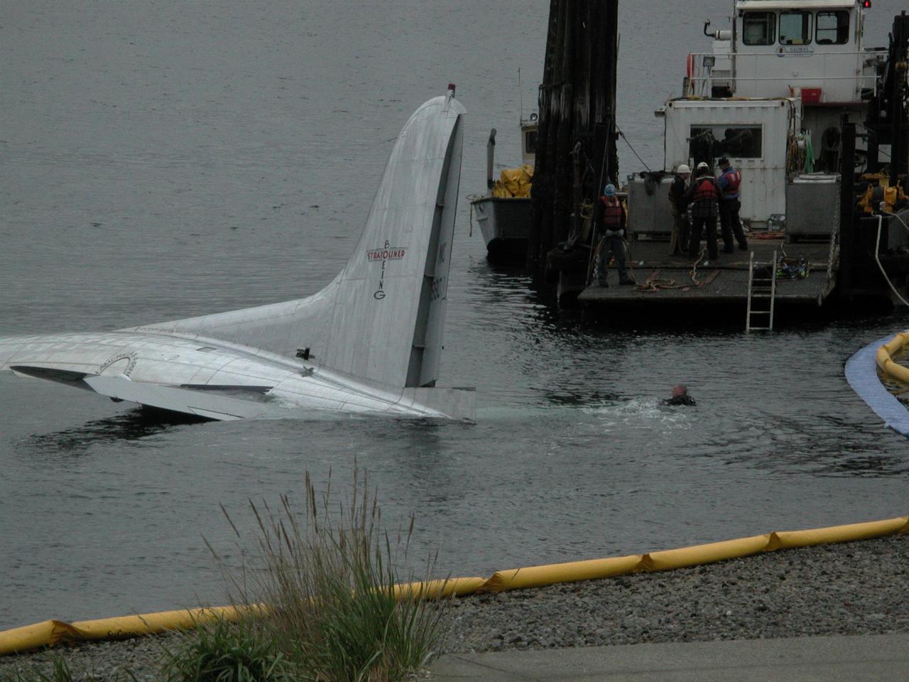 The tail with a diver in the water