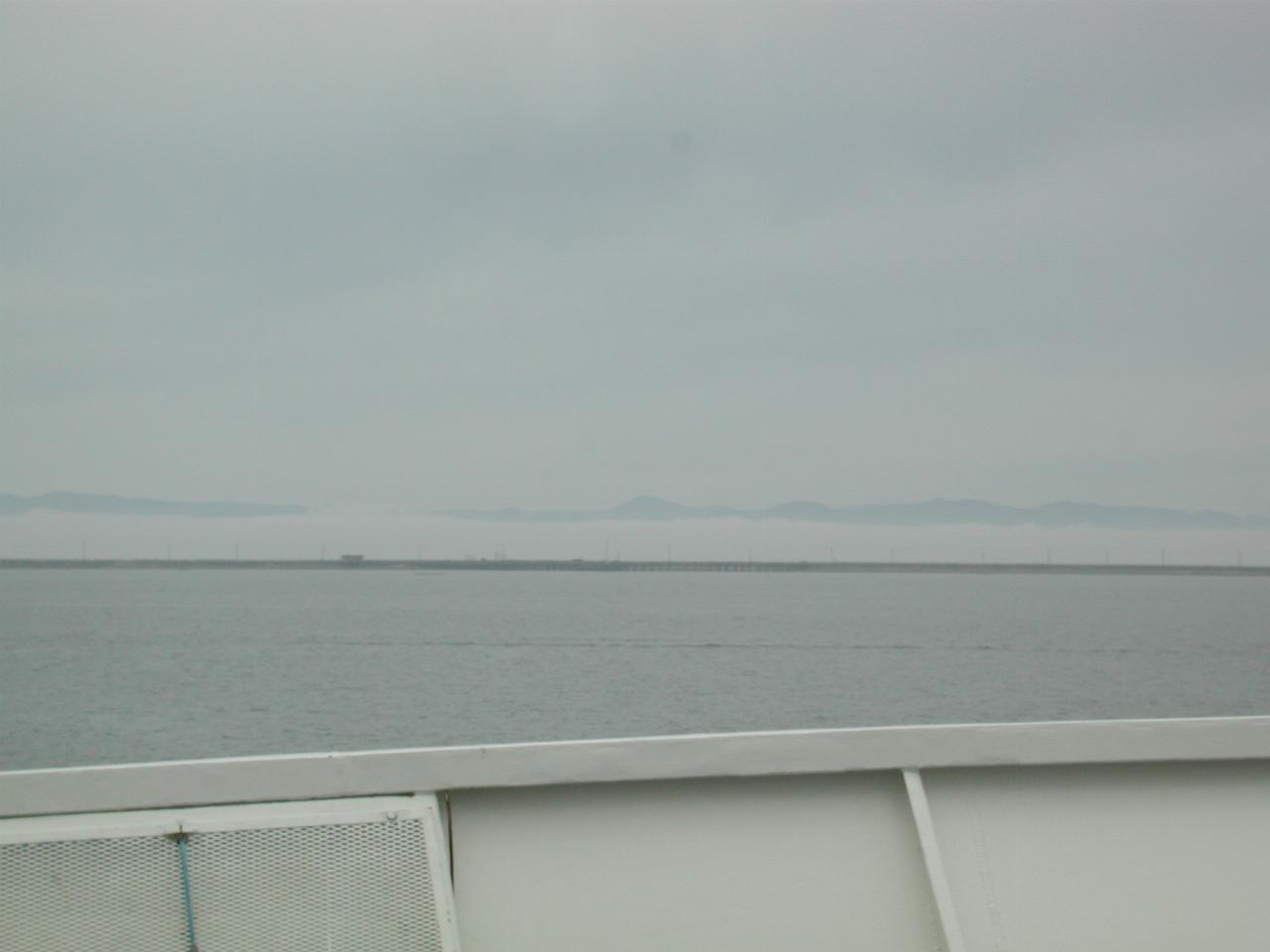 Fog bank and breakwater/spit in Port Angeles