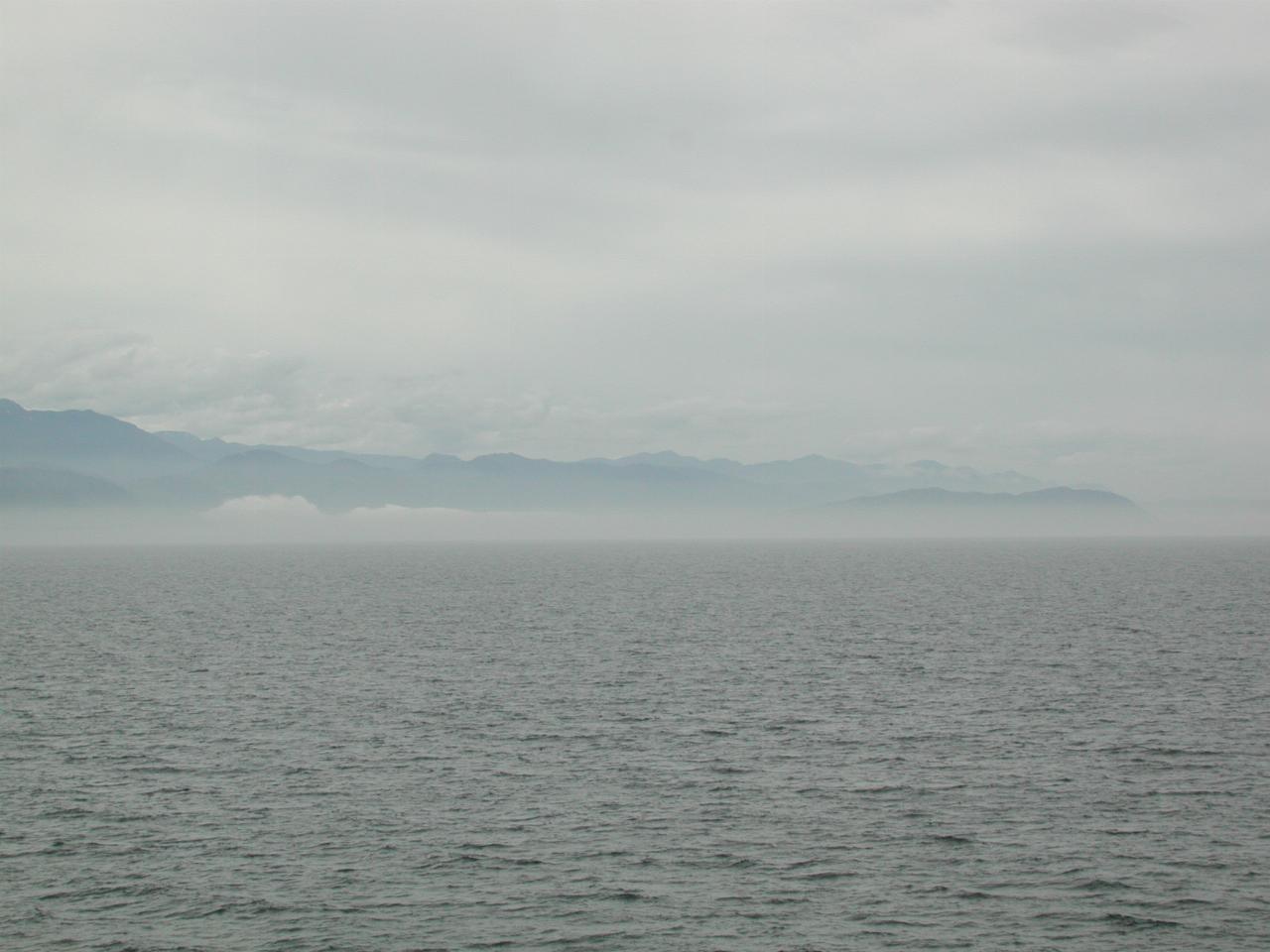 Olympic Mountains and fog bank, looking west (roughly)