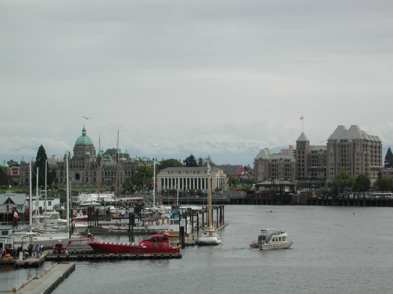 BC Parliament and Hotel Grand Pacific and Olympic Mountains backdrop