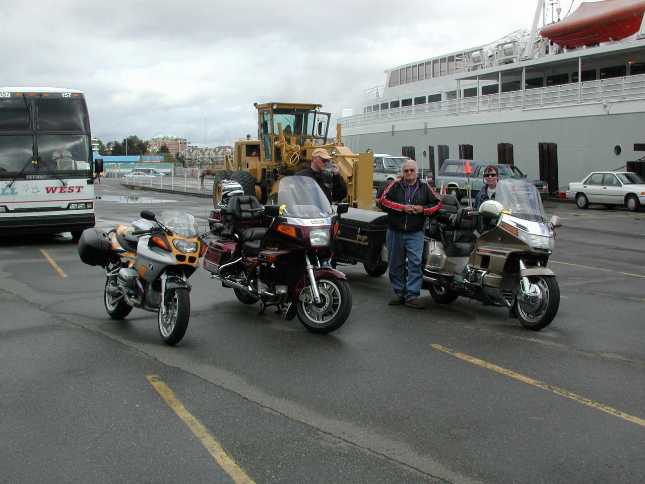 My bike (left) and a couple of other bikers heading to Port Angeles on MV Coho (background)