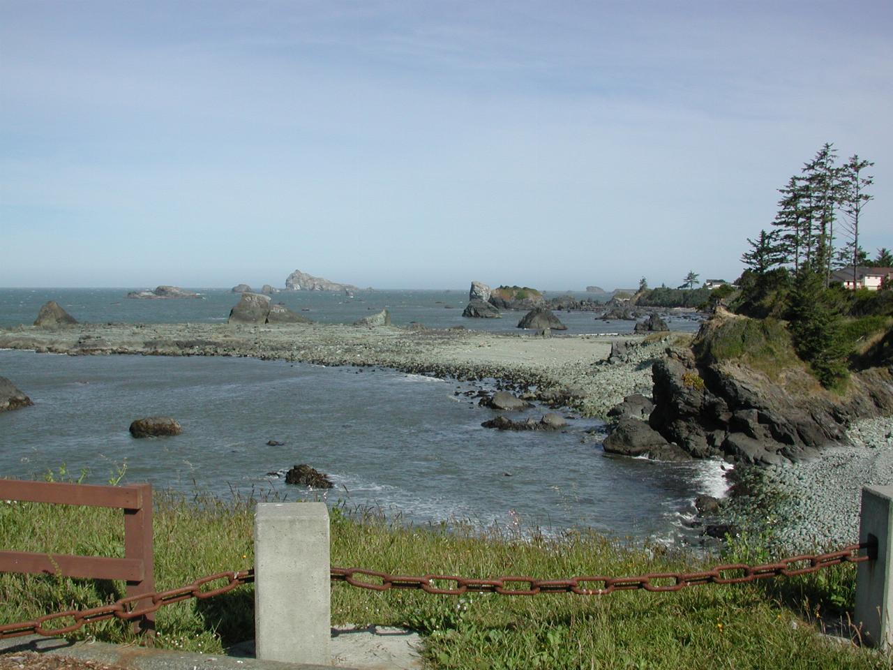 Looking north along seashore of Crescent City, CA