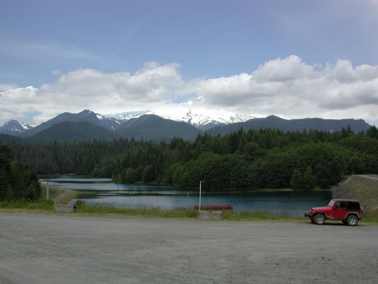 Mt. Baker, obscured by clouds, with overflow area at Baker Lake