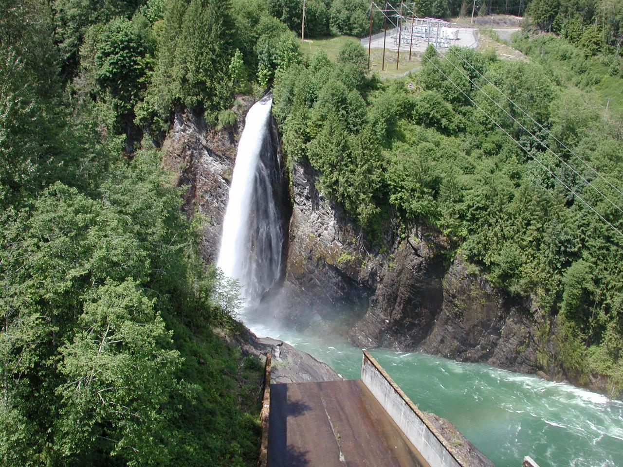 Not sure where the overflow is coming from, but it seems to be stream flow below dam level; spillway in bottom of image