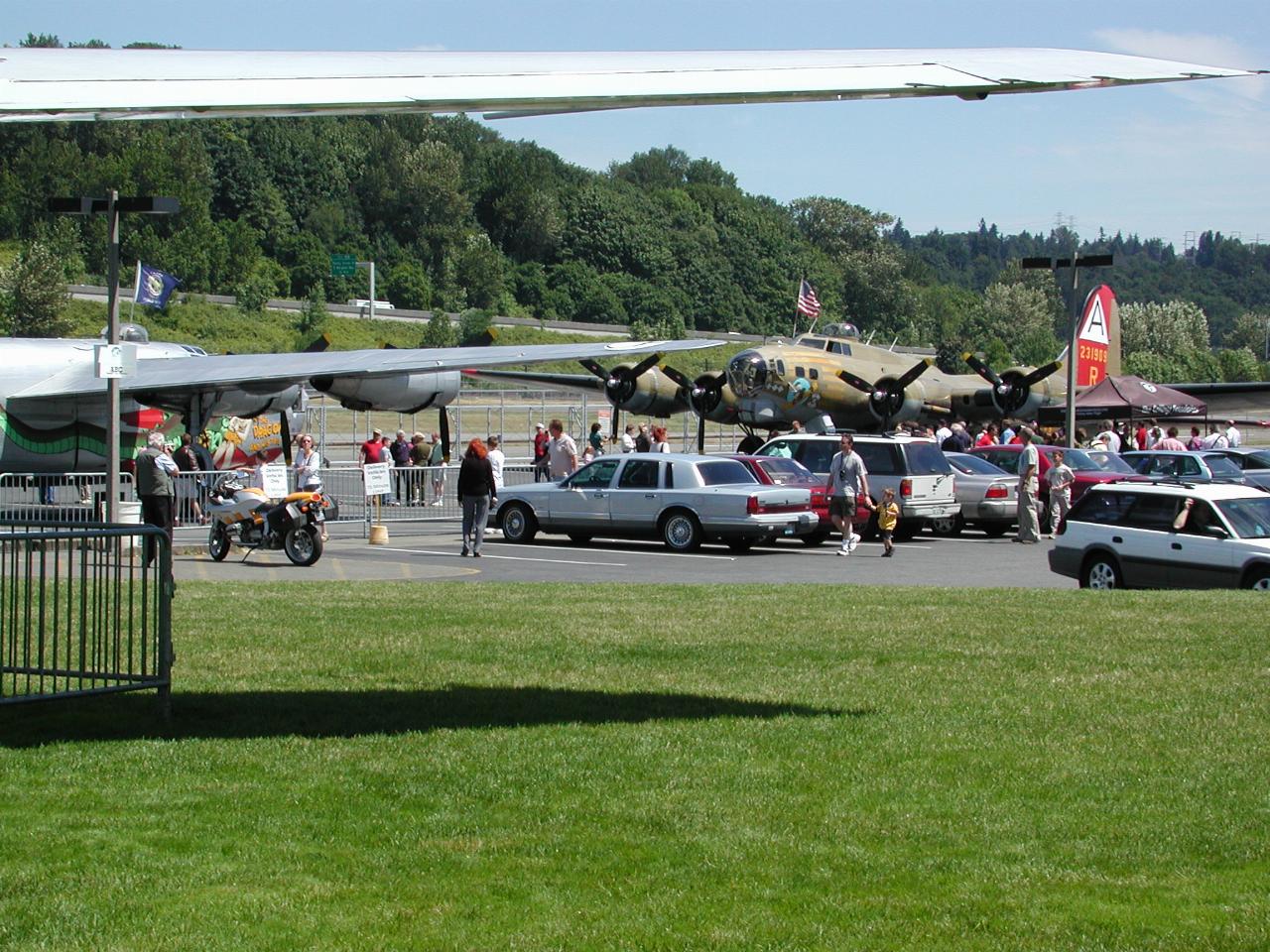 The B-24 and B-17 from under the wing of Air Force 1 (retired); and my bike too