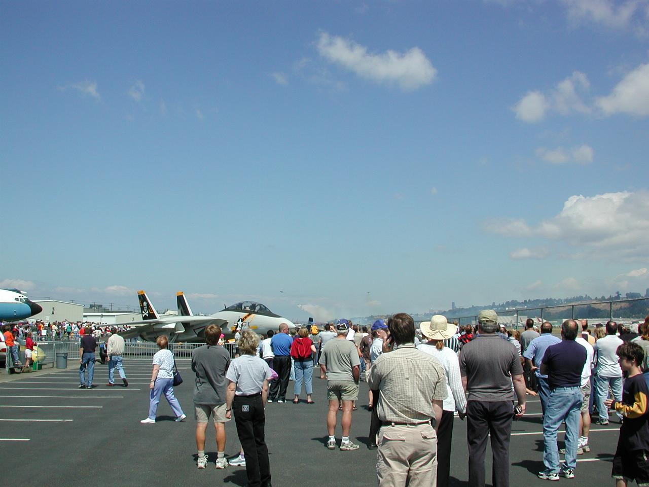 Blue Angels off - 4 behind smoke screen, back makers to left or right