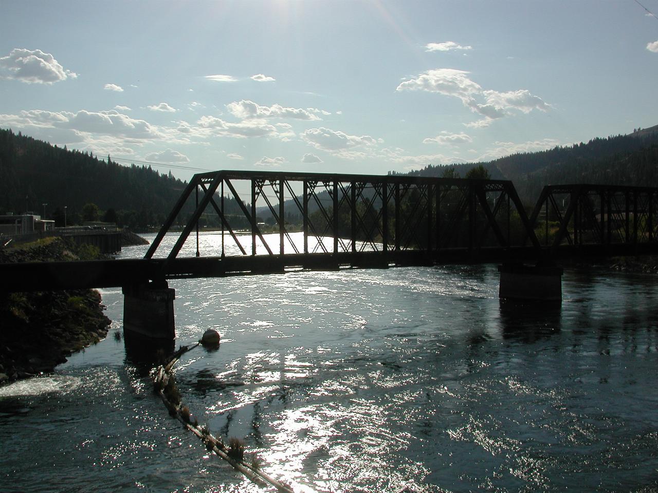 Train bridge over North Fork of Clearwater River below Dworshak Dam, ID, flowing into Clearwater River