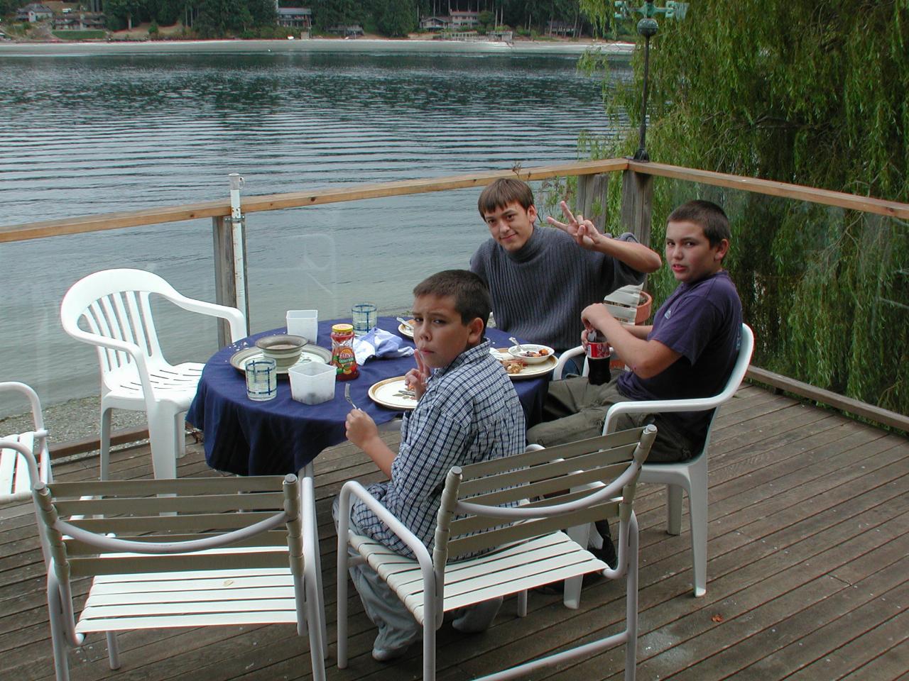 Boys braving outdoors for lunch: Thomas, Nick and Michael