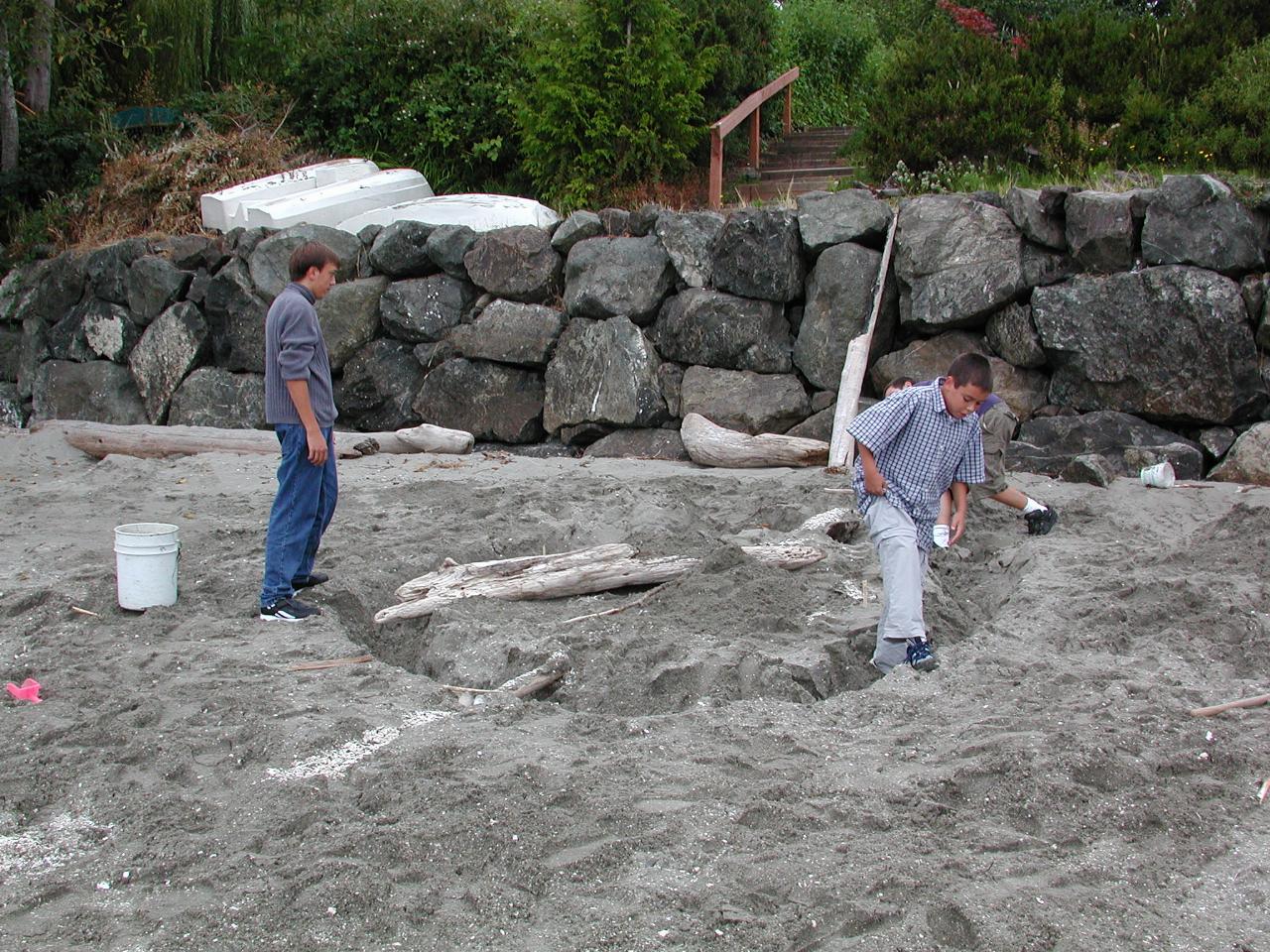 Human assistance to fill in the excavation