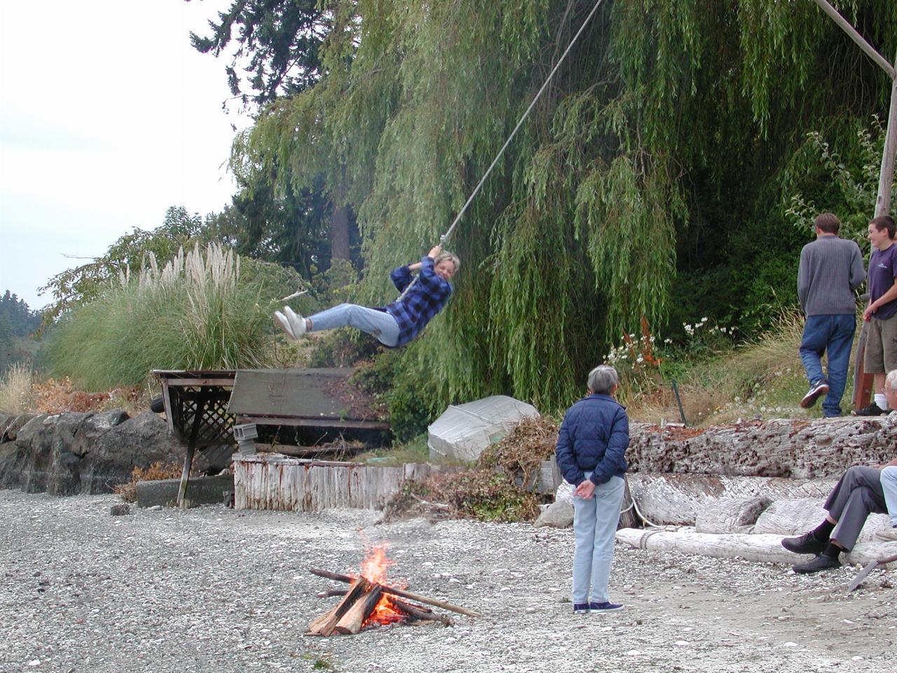 Dare devil Pilar on swing (NOT over the fire, that's an illusion)