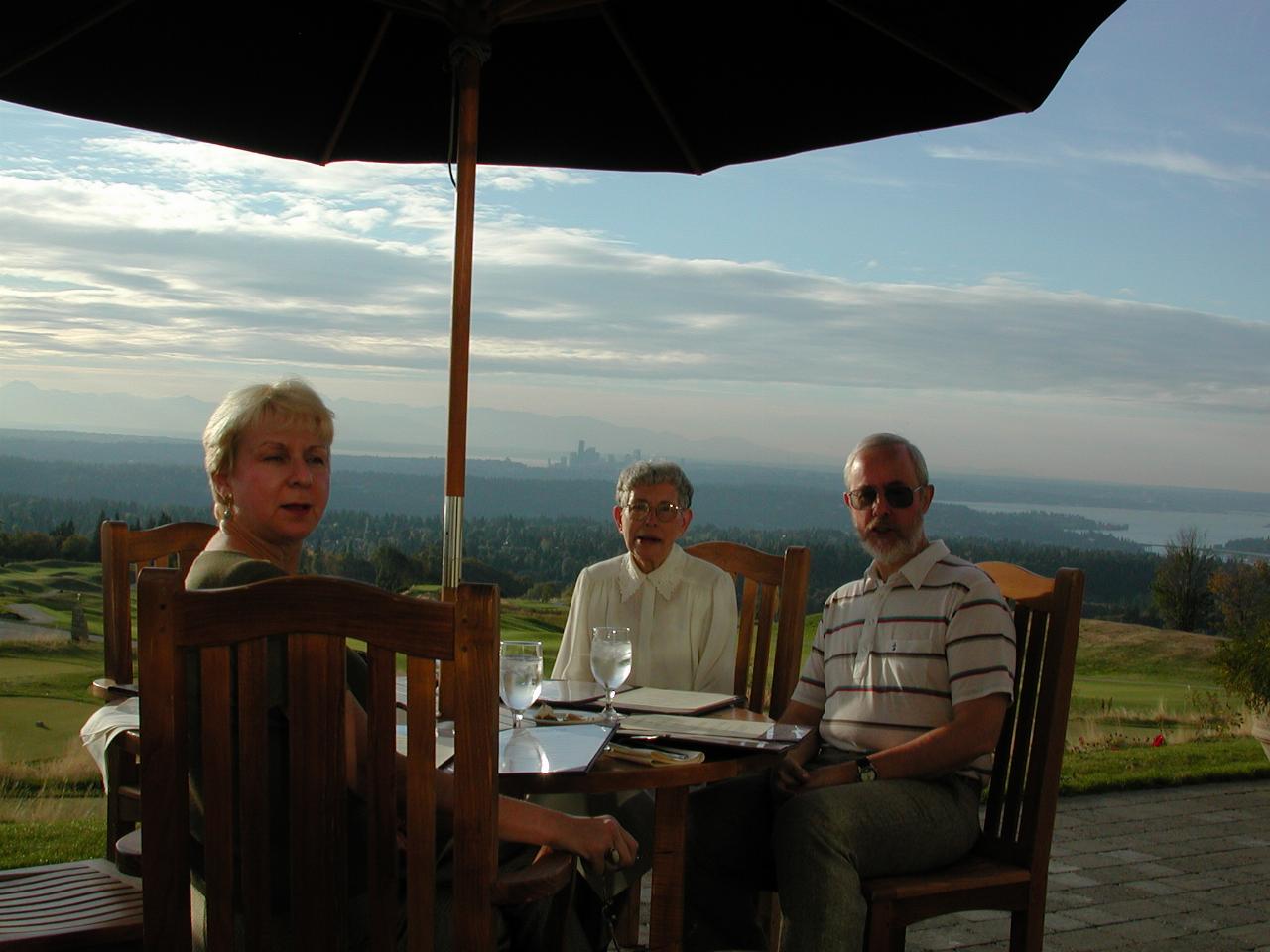 Judy, Marie and Lindsay at Newcastle Golf Club; downtown Seattle behind