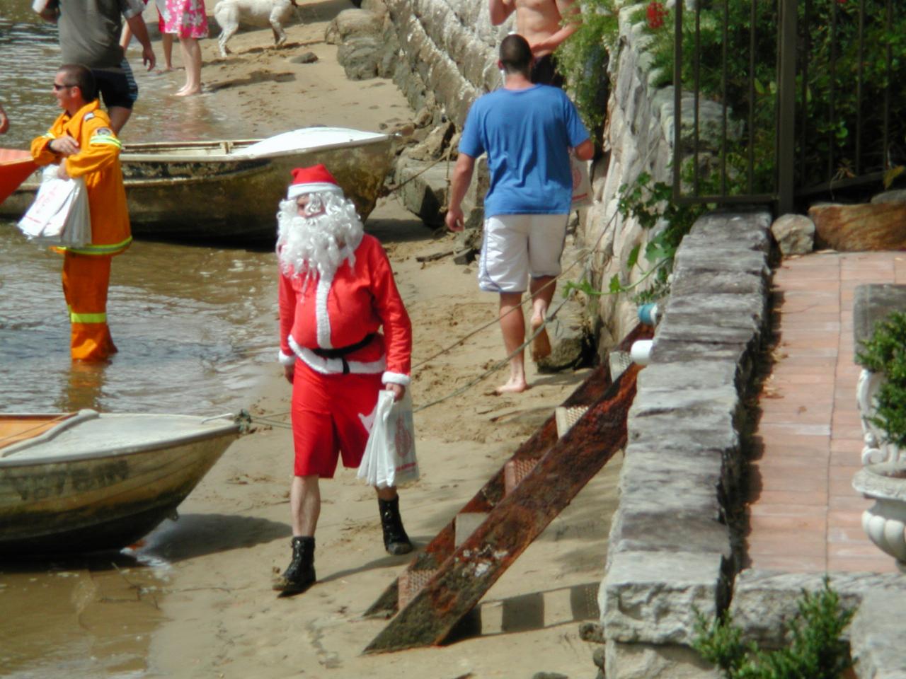 Santa walking down towards the next group