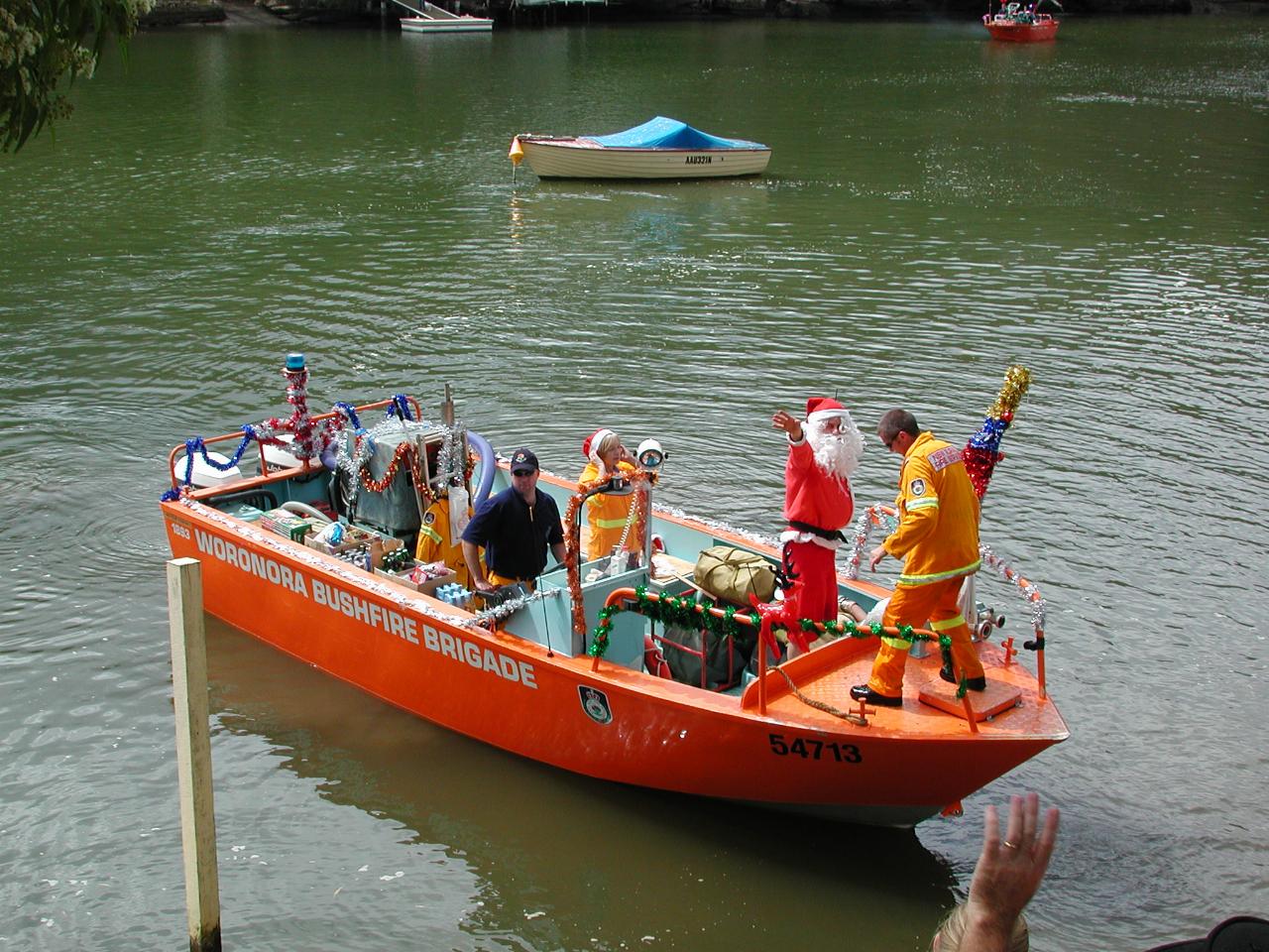 Santa's boat pulls away from shore