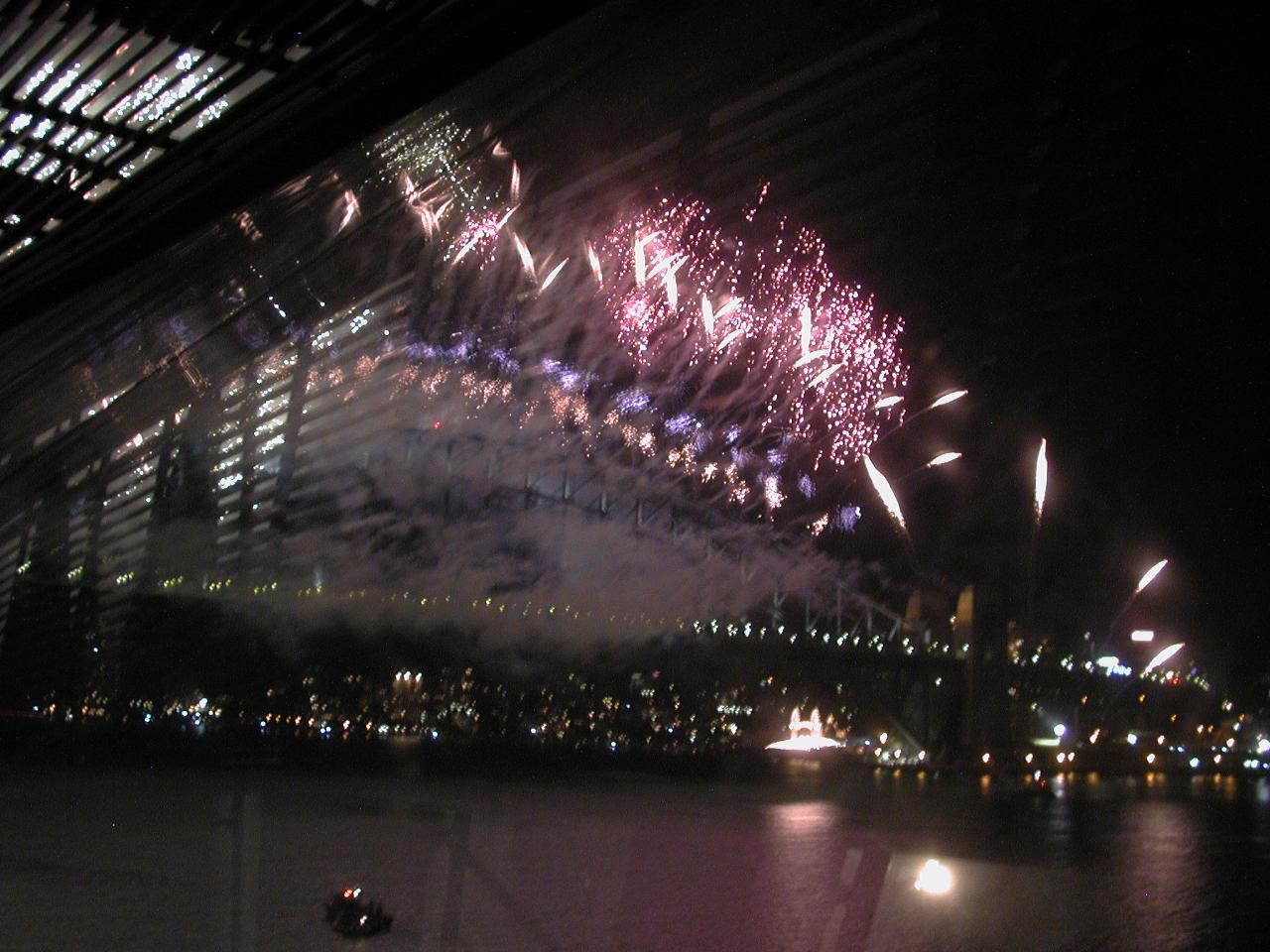 Fireworks cascading off the Harbour Bridge