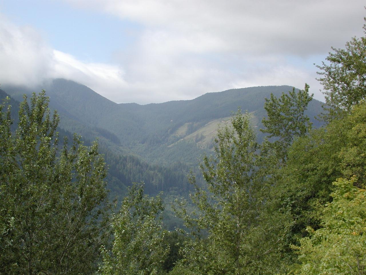 Mountains and low clouds as seen from Swift Dam, Lewis River