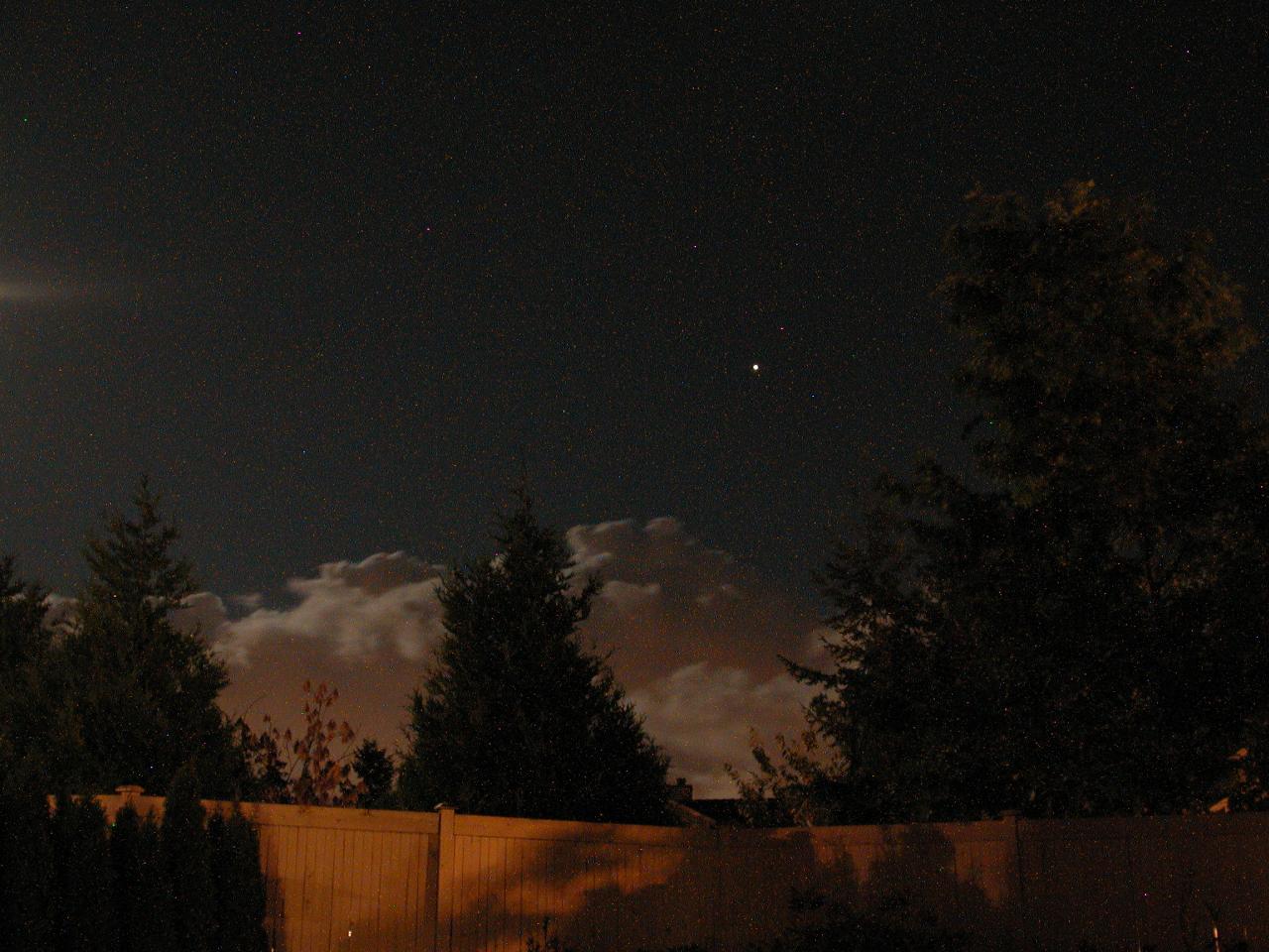 Mars (near closest approach for a long time) and clouds as seen from my back patio in Kenmore