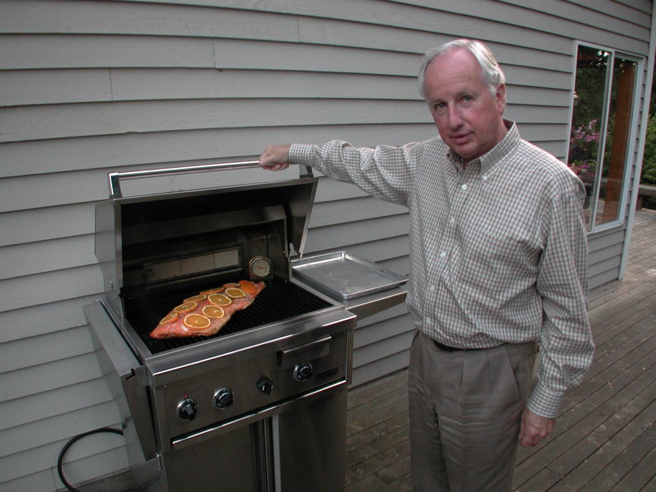 Chef Bill at the barbeque with the salmon