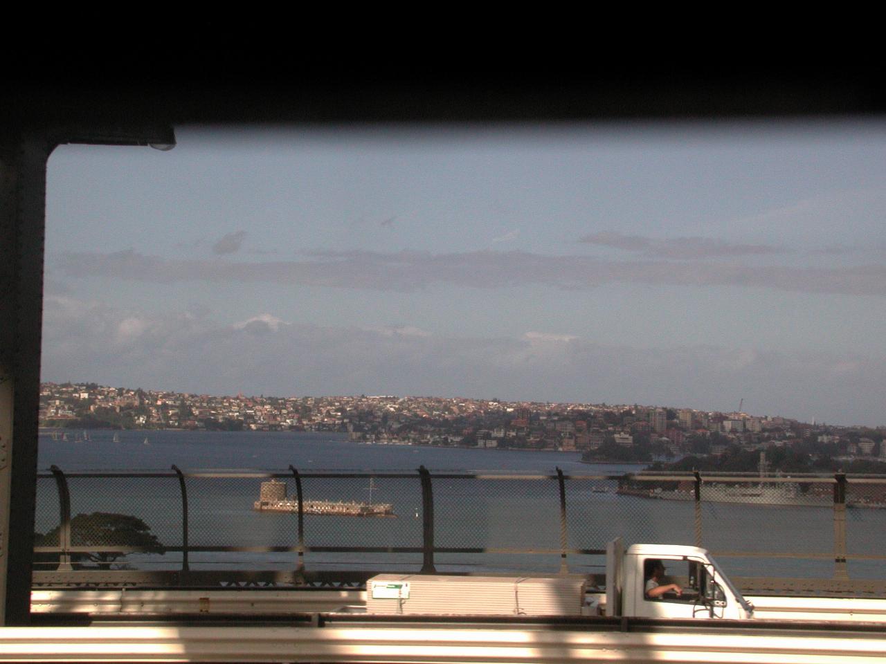 Fort Dennison and Garden Island from train crossing Harbour Bridge