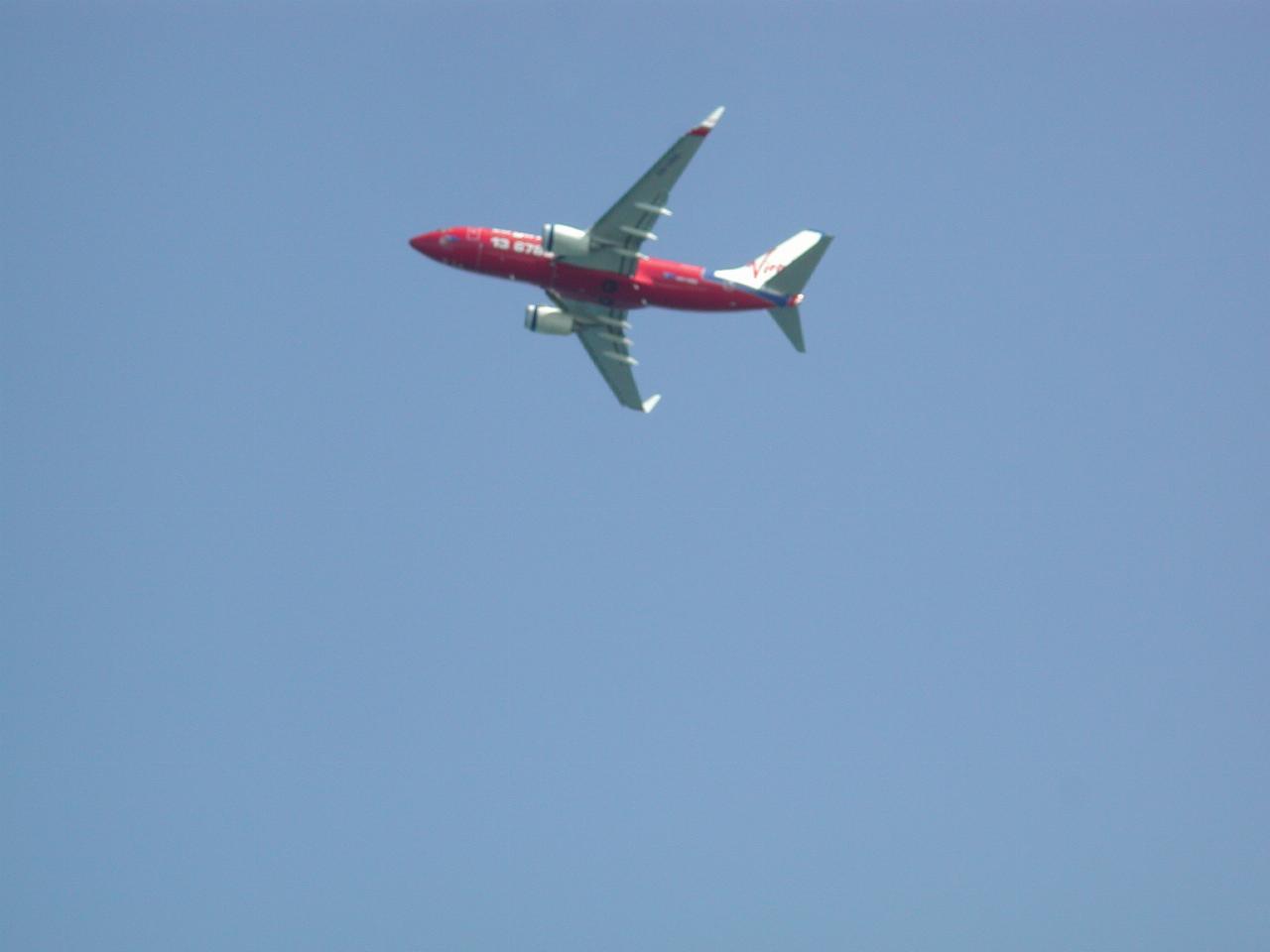 Virgin Airlines plane passing Port Botany after take-off from Mascot