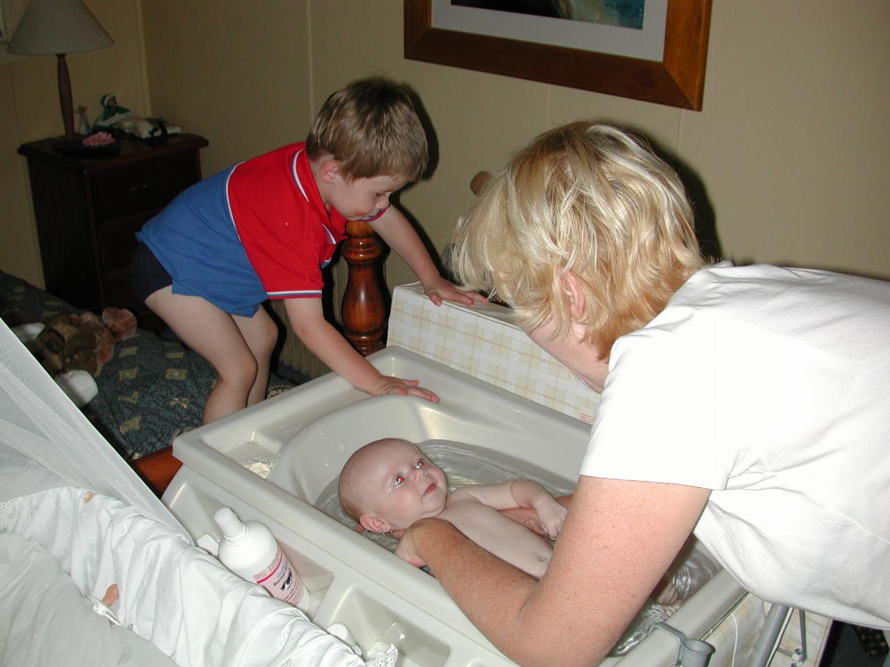 Jake and Michelle with Flynn in the bath