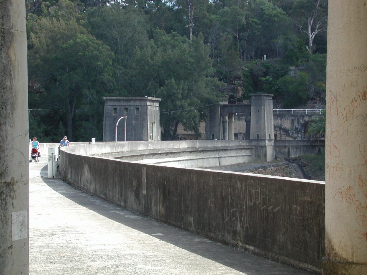 Looking through one gateway to the other along Avon Dam wall