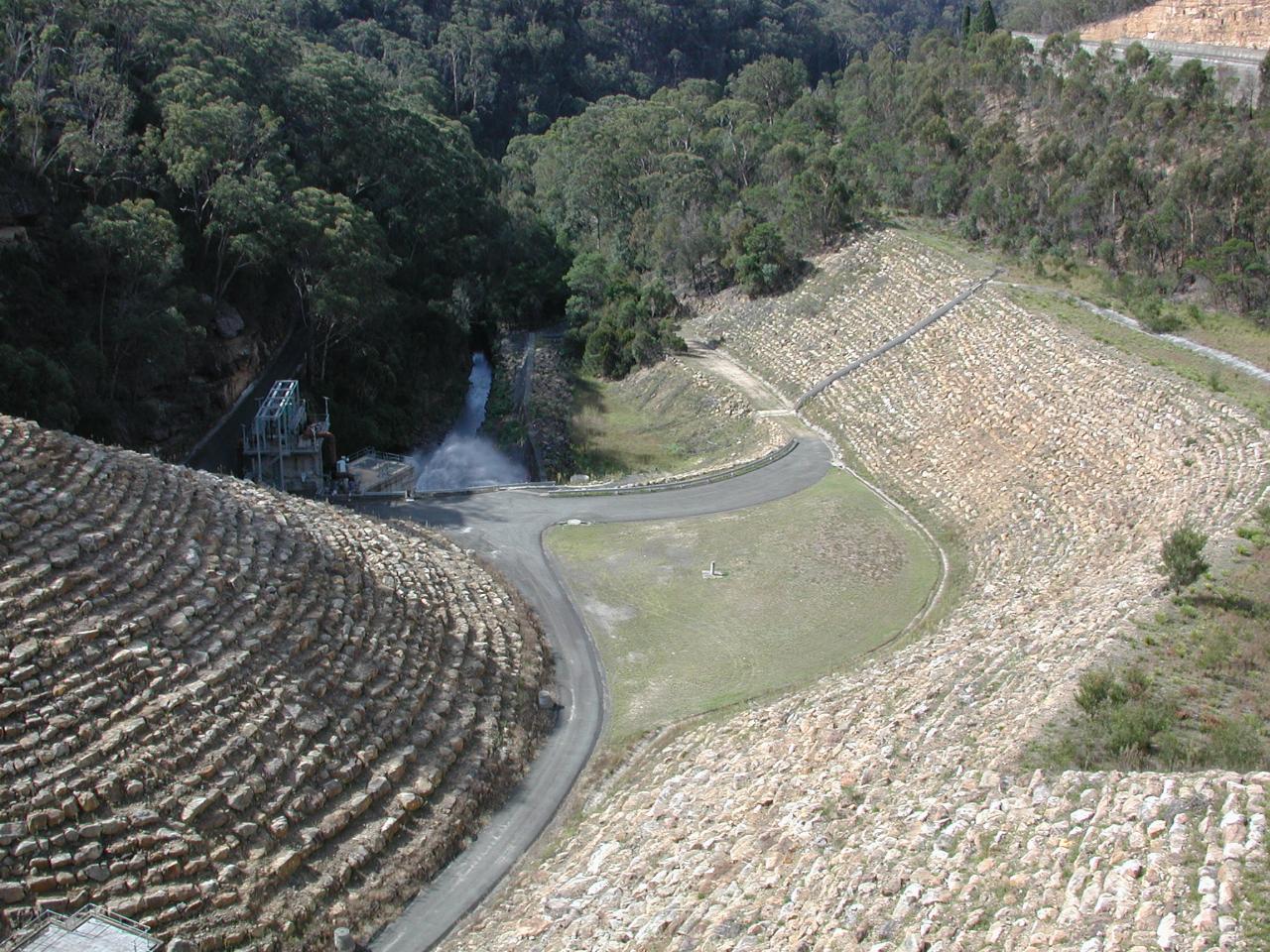 Looking downstream from Nepean Dam, showing water outlet in action