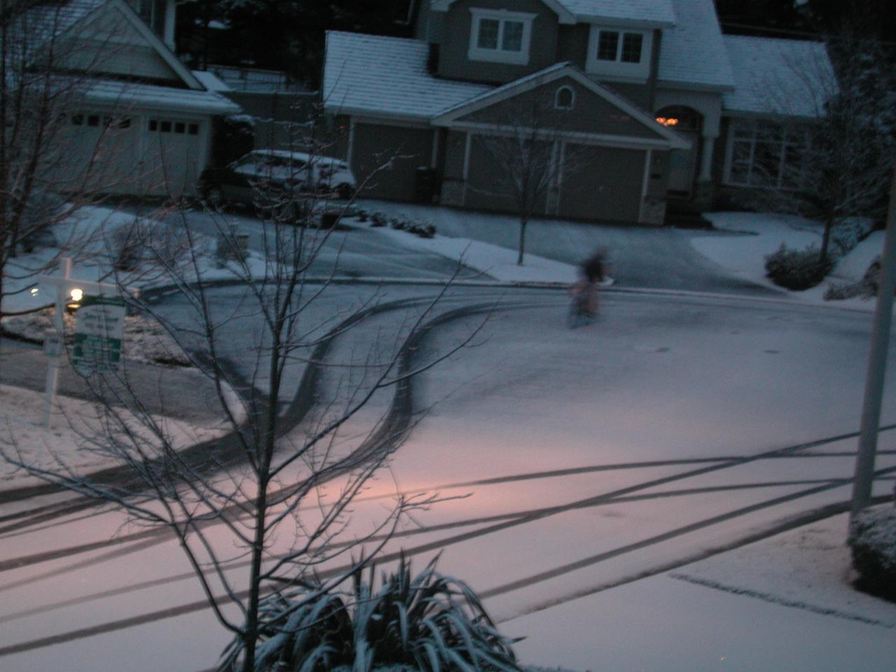 Phantom bike rider in NE 151st Court Kenmore on a snowy morning