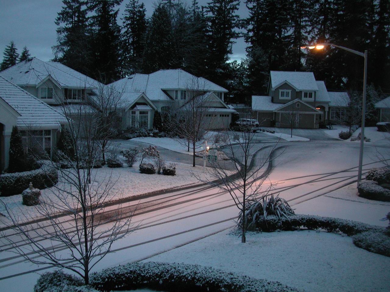 Snowy front street for first winter snowfall in Kenmore looking NE