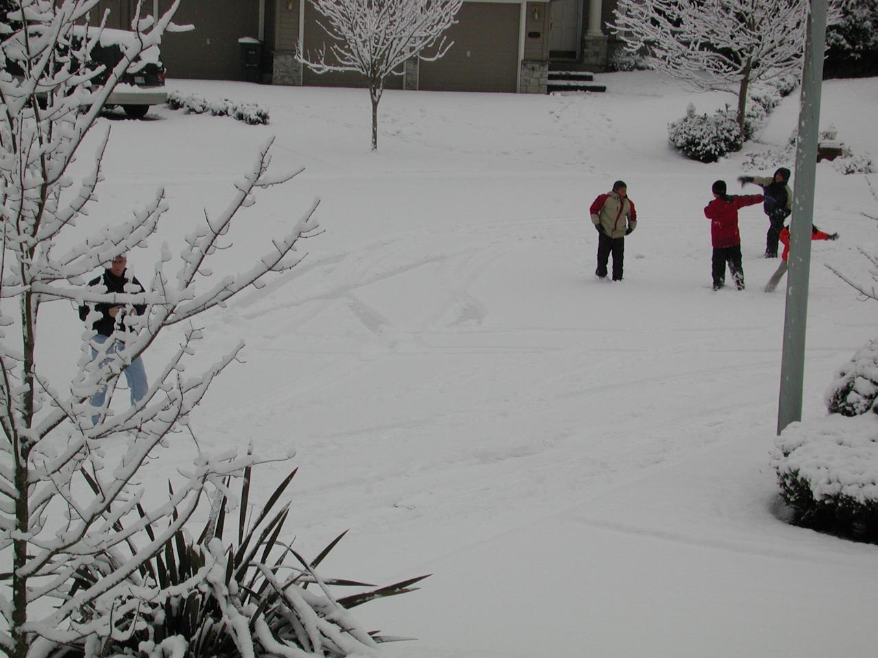 Denny photographing his house, and kids playing in street