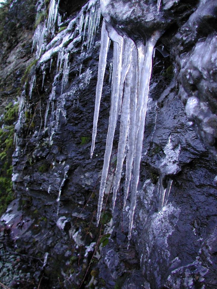 Closer view of icicles on rock face at south end of Upper Baker Dam