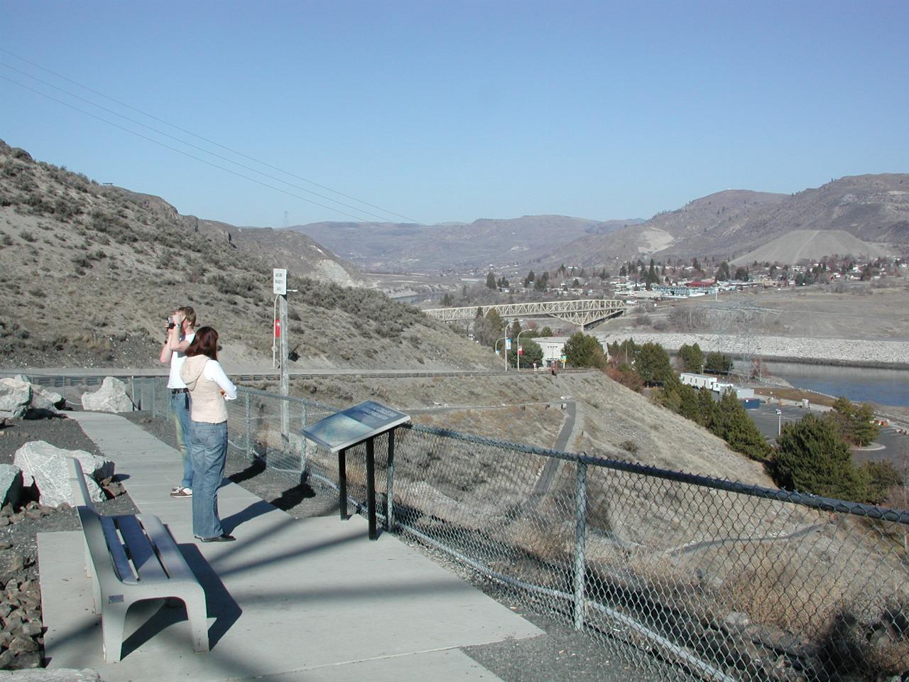 Keiran and Natalie at Grand Coulee Dam,  looking downstream along the Columbia River