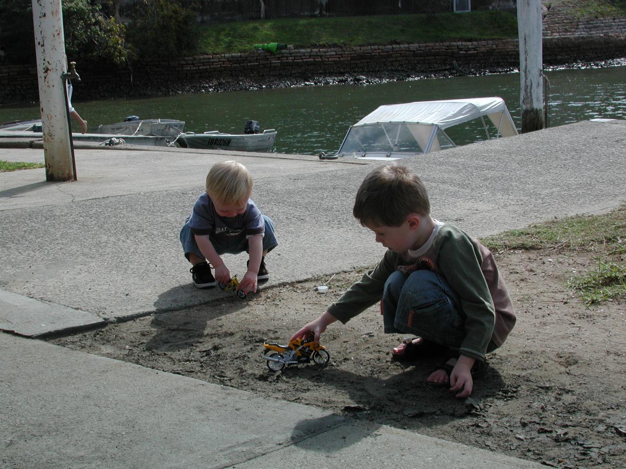 Jake and Flynn playing in the dirt