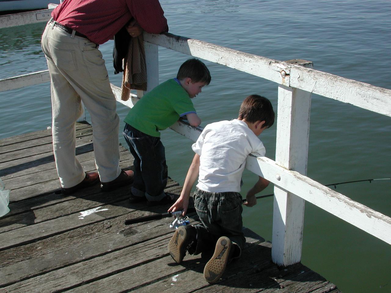 Boys fishing from dock