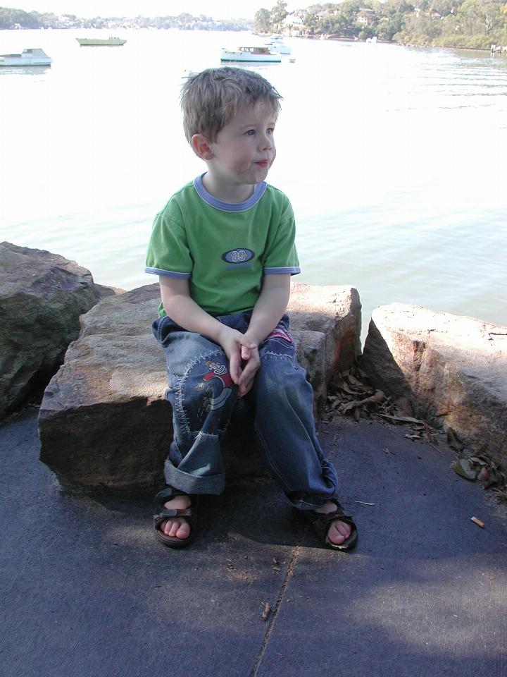 Jake sitting on rock